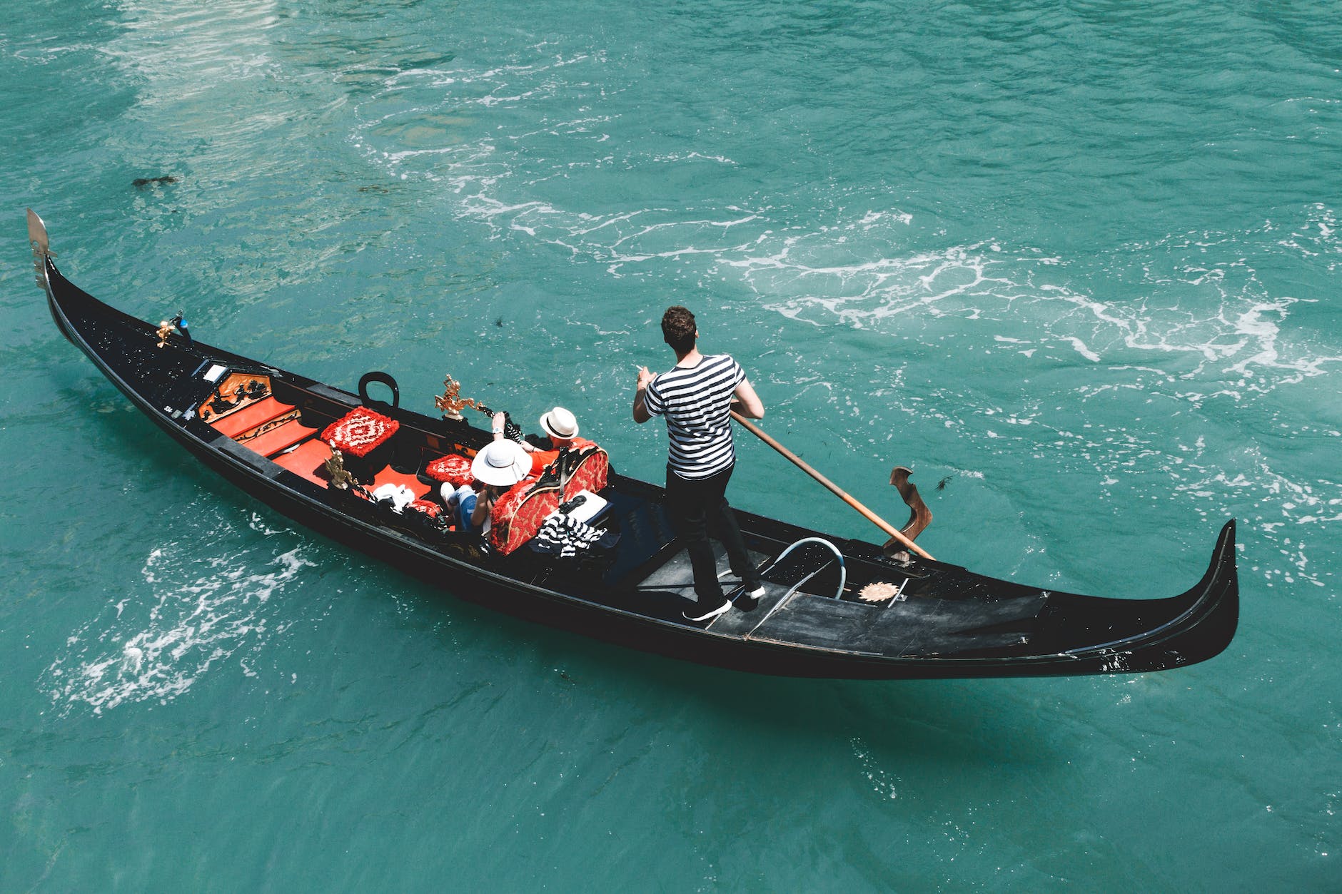 man standing on gondola
