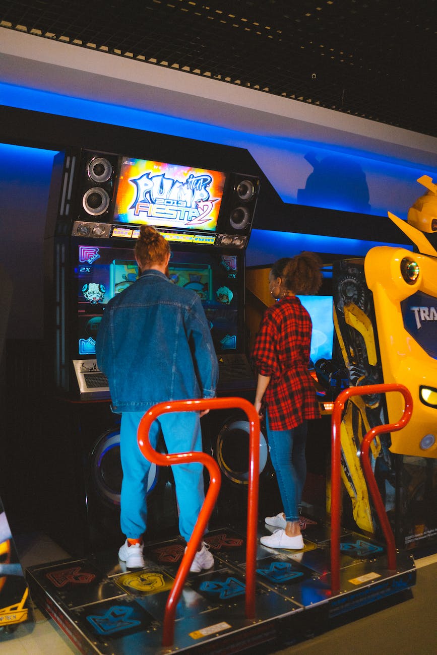 people playing in the arcade
